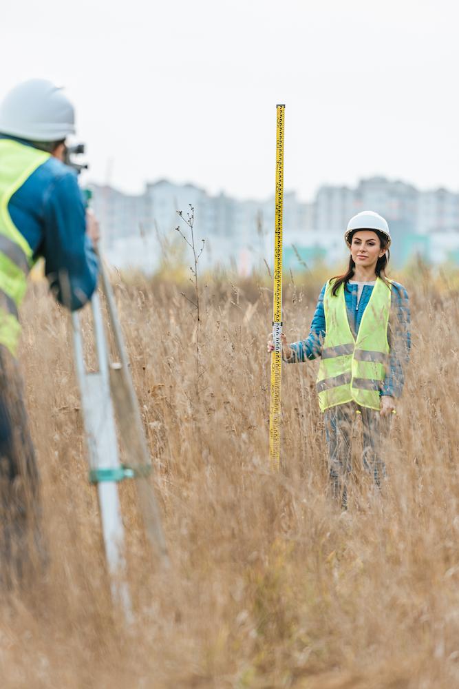 selective-focus-of-surveyors-measuring-land-with-d-2024-11-13-22-51-59-utc (1)